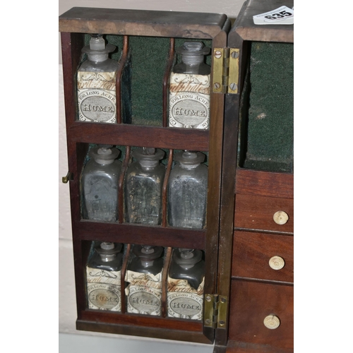 635 - AN EARLY 19TH CENTURY MAHOGANY APOTHECARY'S CABINET, with brass swan neck carrying handle to the top... 