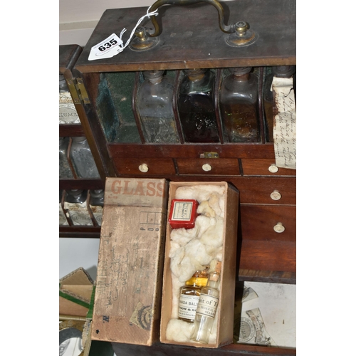 635 - AN EARLY 19TH CENTURY MAHOGANY APOTHECARY'S CABINET, with brass swan neck carrying handle to the top... 