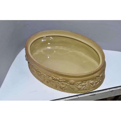 641 - AN EARLY 19TH CENTURY WILSON CANEWARE OVAL GAME PIE TUREEN AND COVER, the cover with damaged oval ha... 