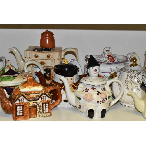 665 - A COLLECTION OF TEAPOTS AND COFFEE POTS, sixteen pieces including some novelty examples, manufacture... 