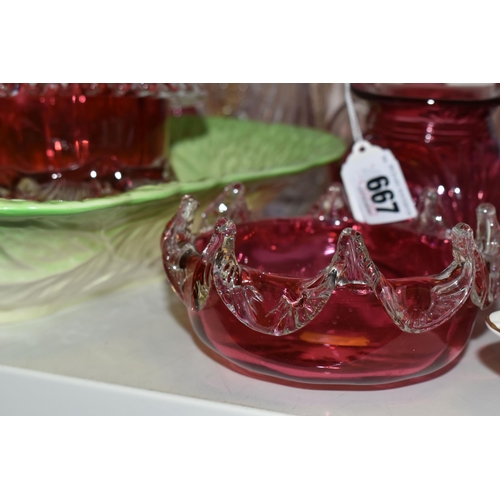 667 - A GROUP OF CRANBERRY GLASS, WITH OTHER GLASS WARES AND CERAMICS, to include a cranberry vase of tria... 