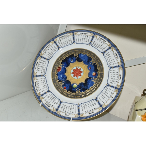 671 - THREE PIECES OF ROYAL WORCESTER 'MILLENNIUM' GIFTWARES, comprising a salad/fruit bowl diameter 23cm ... 