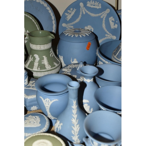 679 - A QUANTITY OF WEDGWOOD JASPERWARES, over sixty pieces to include jugs, vases, a covered vase height ... 