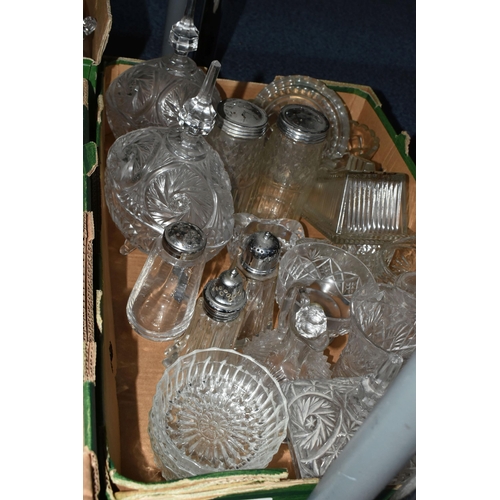 724 - SEVEN BOXES OF GLASSWARE,  a large quantity of mid-century glassware, to include decanters, floral t... 