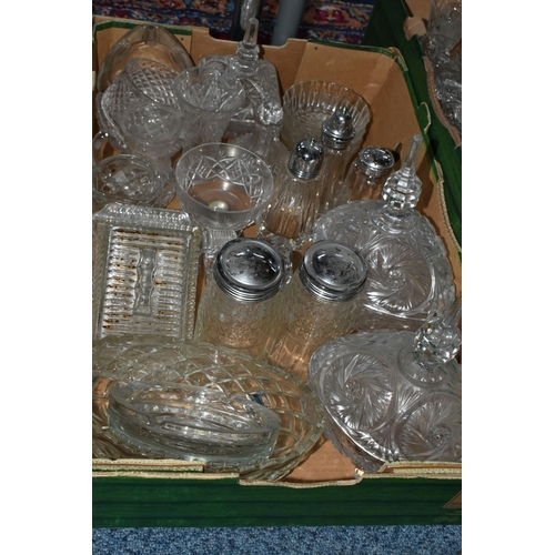 724 - SEVEN BOXES OF GLASSWARE,  a large quantity of mid-century glassware, to include decanters, floral t... 