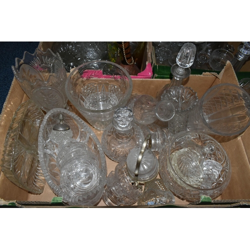 724 - SEVEN BOXES OF GLASSWARE,  a large quantity of mid-century glassware, to include decanters, floral t... 