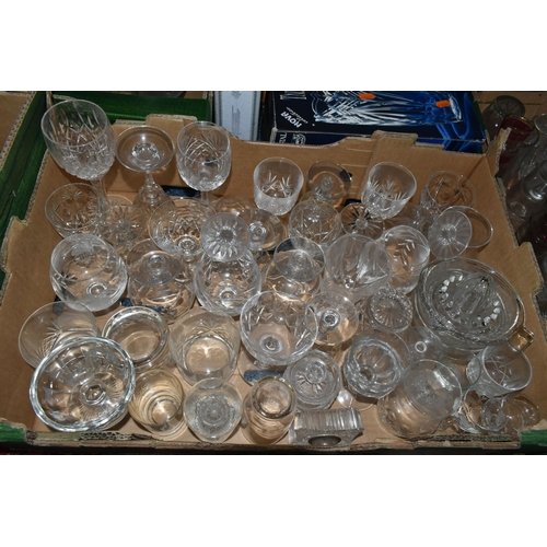 724 - SEVEN BOXES OF GLASSWARE,  a large quantity of mid-century glassware, to include decanters, floral t... 