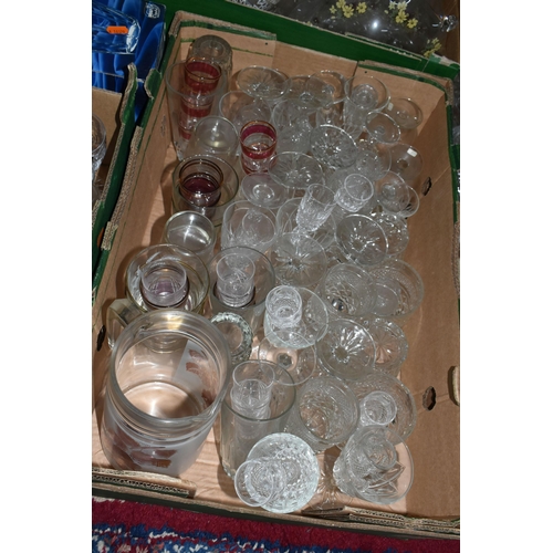 724 - SEVEN BOXES OF GLASSWARE,  a large quantity of mid-century glassware, to include decanters, floral t... 