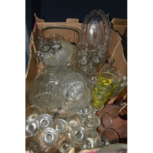 724 - SEVEN BOXES OF GLASSWARE,  a large quantity of mid-century glassware, to include decanters, floral t... 