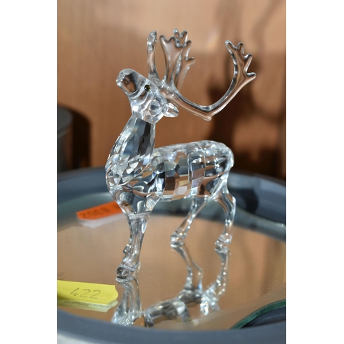 422 - A BOXED SWAROVSKI CRYSTAL REINDEER AND FIVE BOXED SWAROVSKI 'KRIS BEARS', comprising Reindeer no 214... 