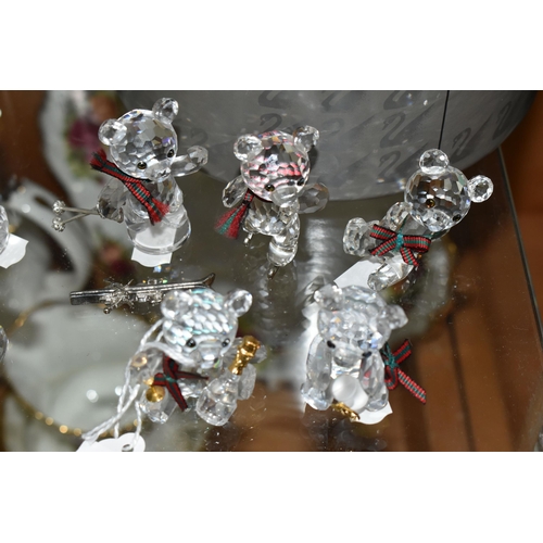 422 - A BOXED SWAROVSKI CRYSTAL REINDEER AND FIVE BOXED SWAROVSKI 'KRIS BEARS', comprising Reindeer no 214... 