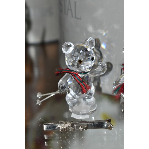 422 - A BOXED SWAROVSKI CRYSTAL REINDEER AND FIVE BOXED SWAROVSKI 'KRIS BEARS', comprising Reindeer no 214... 