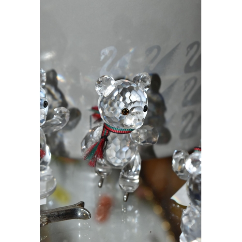 422 - A BOXED SWAROVSKI CRYSTAL REINDEER AND FIVE BOXED SWAROVSKI 'KRIS BEARS', comprising Reindeer no 214... 