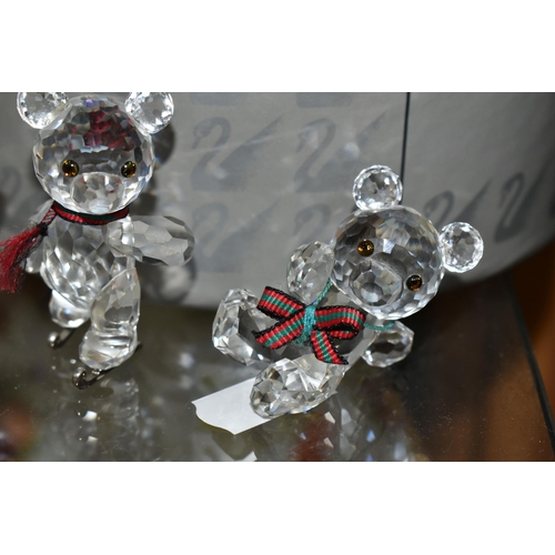 422 - A BOXED SWAROVSKI CRYSTAL REINDEER AND FIVE BOXED SWAROVSKI 'KRIS BEARS', comprising Reindeer no 214... 