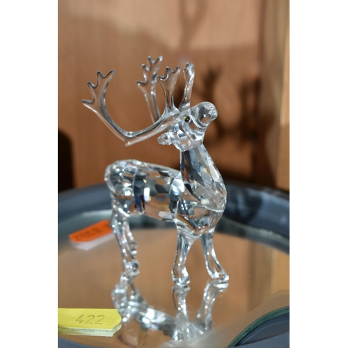 422 - A BOXED SWAROVSKI CRYSTAL REINDEER AND FIVE BOXED SWAROVSKI 'KRIS BEARS', comprising Reindeer no 214... 