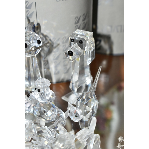 423 - A GROUP OF SWAROVSKI CRYSTAL 'A PETS CORNER' SERIES AND SIMILAR SCULPTURES, comprising a boxed Stand... 