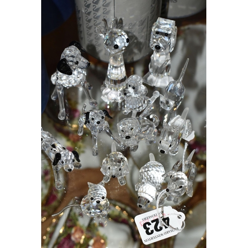 423 - A GROUP OF SWAROVSKI CRYSTAL 'A PETS CORNER' SERIES AND SIMILAR SCULPTURES, comprising a boxed Stand... 