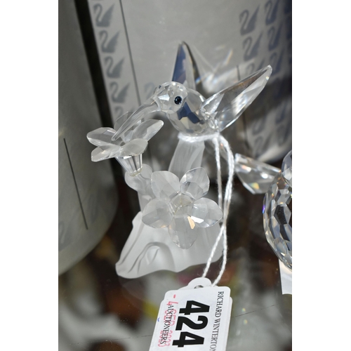 424 - A GROUP OF SWAROVSKI CRYSTAL SCULPTURES, comprising a boxed Stork with Baby in a Basket no 659401 fr... 