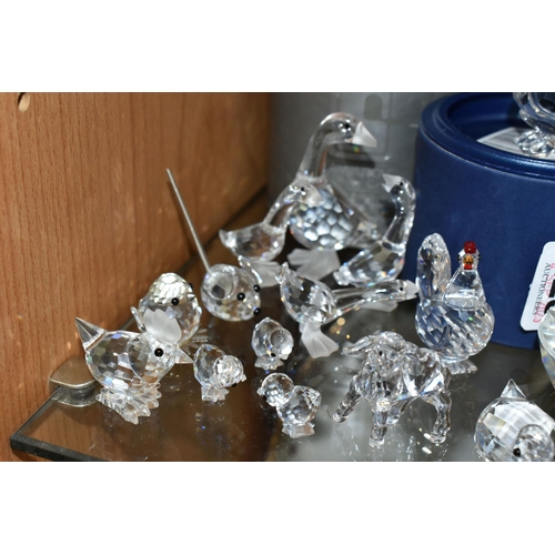 425 - A COLLECTION OF SWAROVSKI CRYSTAL ANIMAL AND BIRD FIGURES, from series including Barnyard Friends, B... 