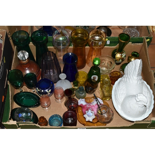 440 - TWO BOXES OF COLOURED GLASSWARE, to include a milk glass egg dish, five coloured glass hyacinth bulb... 