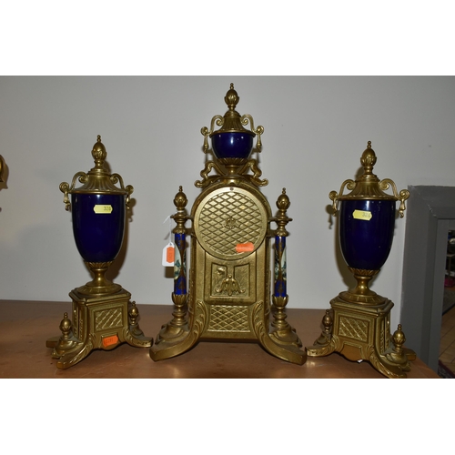 326 - A MODERN ITALIAN 'IMPERIAL' BRASS AND PORCELAIN CLOCK GARNITURE, the finials, columns and front all ... 