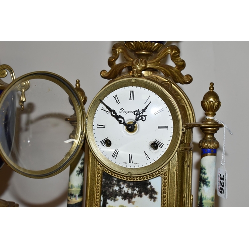 326 - A MODERN ITALIAN 'IMPERIAL' BRASS AND PORCELAIN CLOCK GARNITURE, the finials, columns and front all ... 