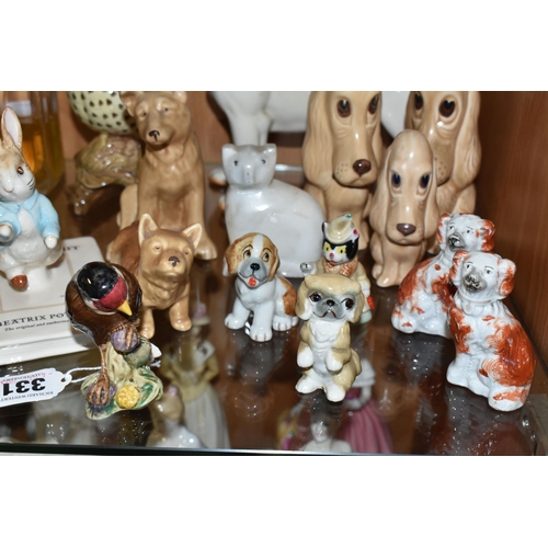 331 - A COLLECTION OF CERAMIC ANIMAL FIGURES, to include a Beswick Peter Rabbit 'Peter on His Book' P4217,... 