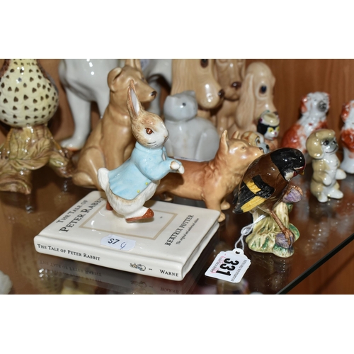 331 - A COLLECTION OF CERAMIC ANIMAL FIGURES, to include a Beswick Peter Rabbit 'Peter on His Book' P4217,... 