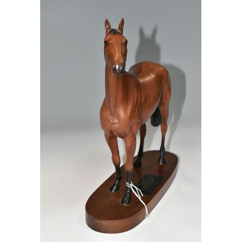 341 - A BESWICK CONNOISSEUR MODEL OF RED RUM, model no 2510, matt, second quality, on a titled oval wooden... 