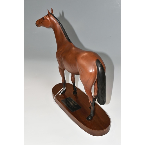 341 - A BESWICK CONNOISSEUR MODEL OF RED RUM, model no 2510, matt, second quality, on a titled oval wooden... 