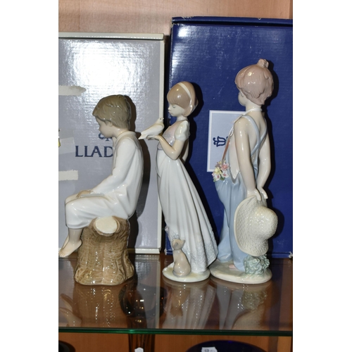 342 - THREE LLADRO FIGURES, comprising a boxed limited edition Pocket Full Of Wishes no 7650, Collectors S... 