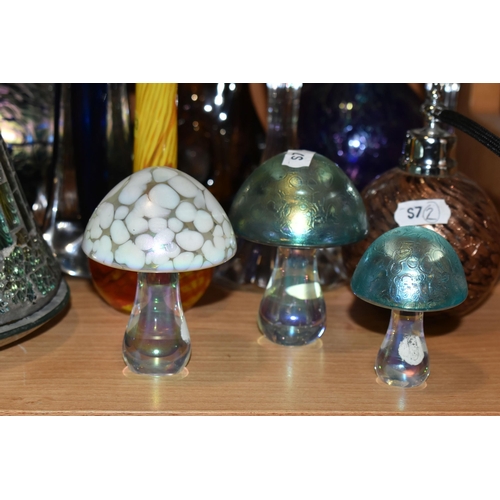 344 - A GROUP OF MODERN COLOURED AND CLEAR GLASSWARE, including three iridescent toadstool paperweights, a... 