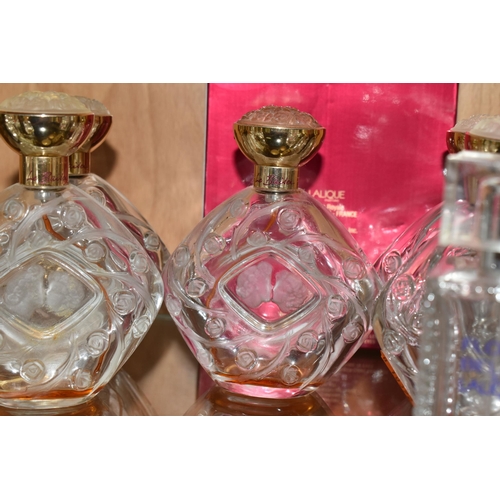 350 - ELEVEN LALIQUE USED BOTTLE OF PERFUMES AND A BOX FOR A BOTTLE OF LE BAISDEN DE LALIQUE, the empty bo... 