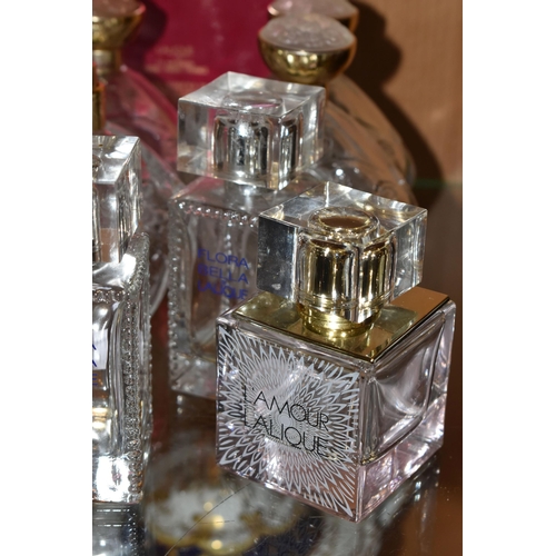 350 - ELEVEN LALIQUE USED BOTTLE OF PERFUMES AND A BOX FOR A BOTTLE OF LE BAISDEN DE LALIQUE, the empty bo... 