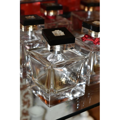 353 - ELEVEN LALIQUE USED BOTTLES OF 'LALIQUE LE PARFUM' BOTTLES, eight are 100ml bottles and three are 50... 