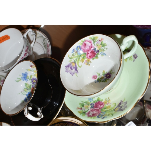 366 - A GROUP OF SIX CHINA CUPS AND SAUCERS, comprising a Paragon cup and saucer pattern A1153, decorated ... 