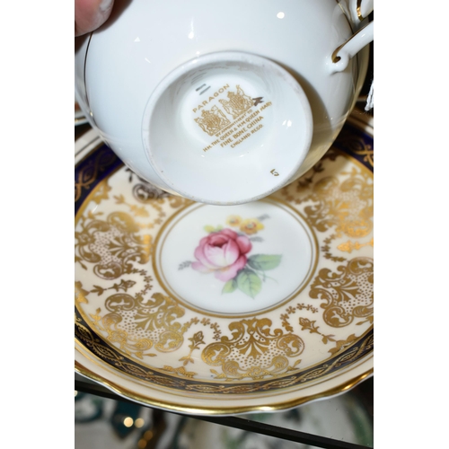 366 - A GROUP OF SIX CHINA CUPS AND SAUCERS, comprising a Paragon cup and saucer pattern A1153, decorated ... 