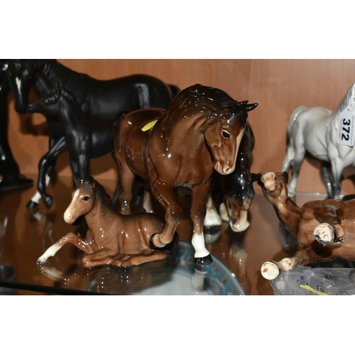 372 - A GROUP OF  HORSES, comprising a Royal Doulton Welsh Mare (both front legs broken and glued, chipped... 