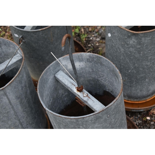 1005 - FOUR GALVANISED METAL CHICKEN FEEDERS, with hanging hooks, two marked Eltex, height 64cm (condition ... 