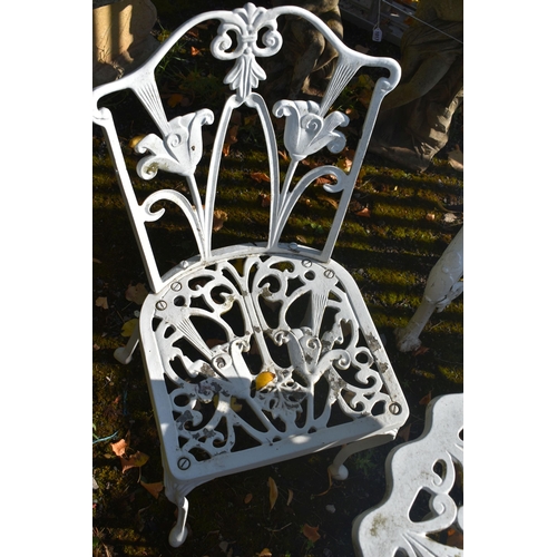 1018 - A WHITE PAINTED CAST ALUMINIUM FOUR PIECE BISTRO SET, comprising a circular table, with a wavy edge,... 