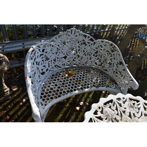 1018 - A WHITE PAINTED CAST ALUMINIUM FOUR PIECE BISTRO SET, comprising a circular table, with a wavy edge,... 