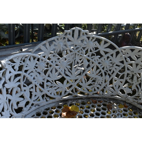 1018 - A WHITE PAINTED CAST ALUMINIUM FOUR PIECE BISTRO SET, comprising a circular table, with a wavy edge,... 