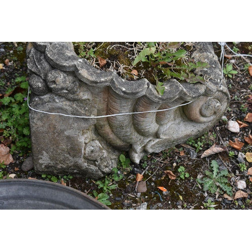 1026 - A PAIR OF COMPOSITE GARDEN PLANTERS, with scrolled and shell style design, length 53cm x width 38cm ... 