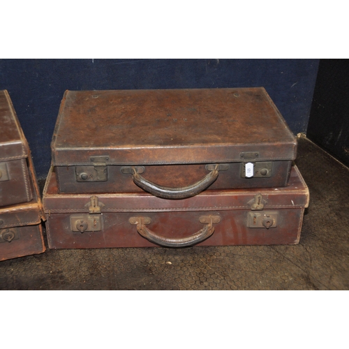 1051 - A COLLECTION OF SEVEN LEATHER CASES comprising of a suitcase width 66cm x depth 36cm x height 17cm w... 