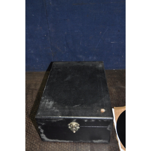 1092 - A COLUMBIA TABLETOP WIND UP GRAMAPHONE with black leather effect covering and three 12in 78s (Condit... 