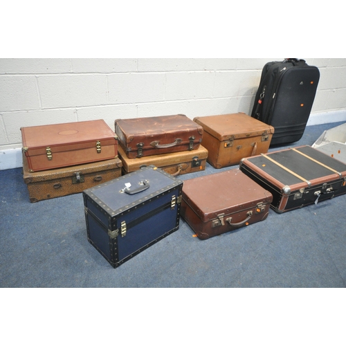 1203 - A SELECTION OF LUGGAGE, to include a tan leather suitcase, five various other suitcases, a wheeled t... 