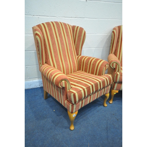 1224 - A PAIR OF RED STRIPPED WING BACK ARMCHAIRS, on beech legs (condition report: good)