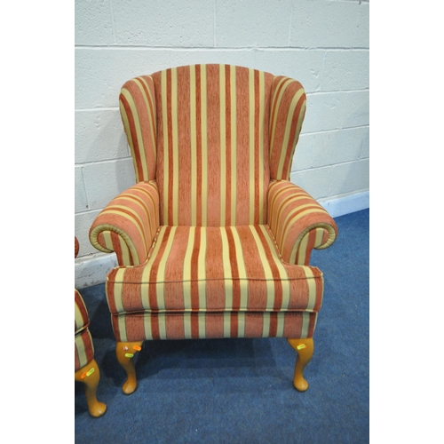 1224 - A PAIR OF RED STRIPPED WING BACK ARMCHAIRS, on beech legs (condition report: good)