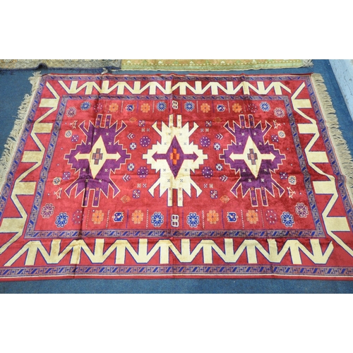 1227 - A SELECTION OF RUGS AND TAPESTRIES, to include a faux silk red rug, 204cm x 136cm, classical scene r... 