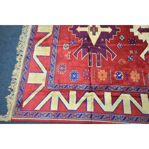 1227 - A SELECTION OF RUGS AND TAPESTRIES, to include a faux silk red rug, 204cm x 136cm, classical scene r... 